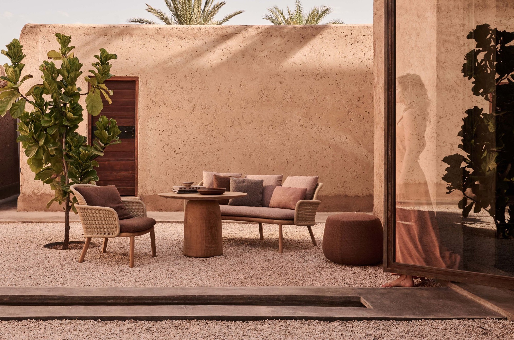 Suro outdoor sofa in a warm contemporary terrace setting
