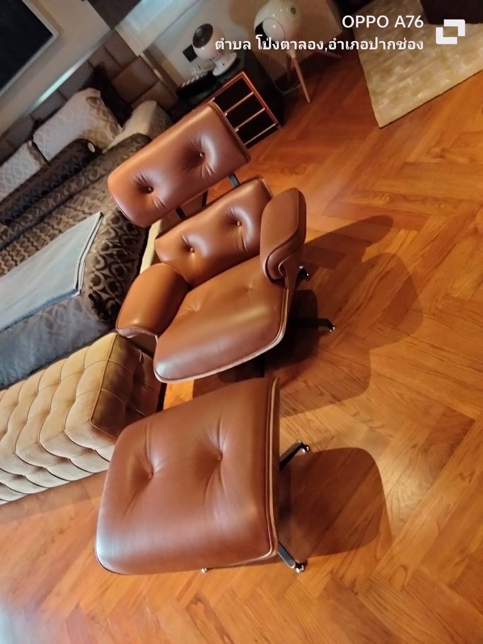 Brown lounge chair with matching ottoman in a customer's living room, Bunise order GF-000446