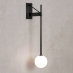 Black globe wall lamp with a triangular wall bracket and long vertical stem.