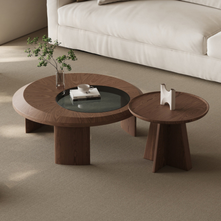 Lorema solid wood coffee table set with two round tables beside a cream sofa