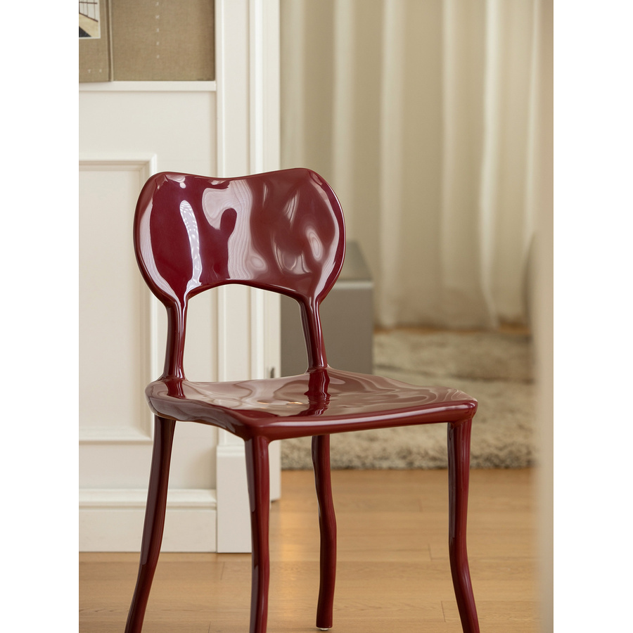 bunise-76794-clay-sculptural-dining-chair-main-900-714a92 Burgundy red Clay sculptural ABS dining chair with a glossy curved backrest