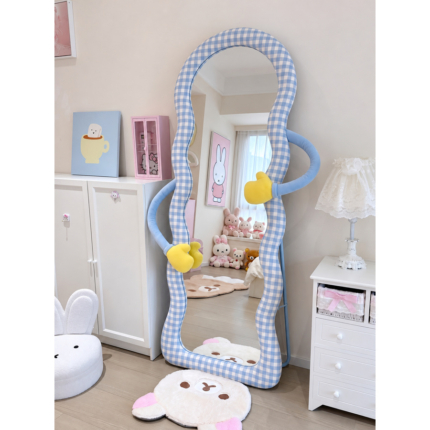 Hug Blue Gingham Floor Mirror with a wavy upholstered frame and yellow mitten accents