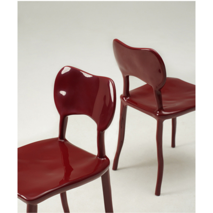 Front and rear views of the burgundy Clay dining chair