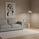 White Doma floor lamp beside a pale sofa