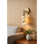 Veyra Luxury Stone Dark wall lamp above a living-room side table