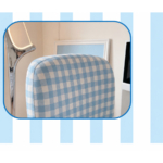 Close-up of the padded blue and white gingham backrest on the Landi vanity stool