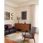 Wave-front sideboard shown in a living room with a sofa and patterned armchair.