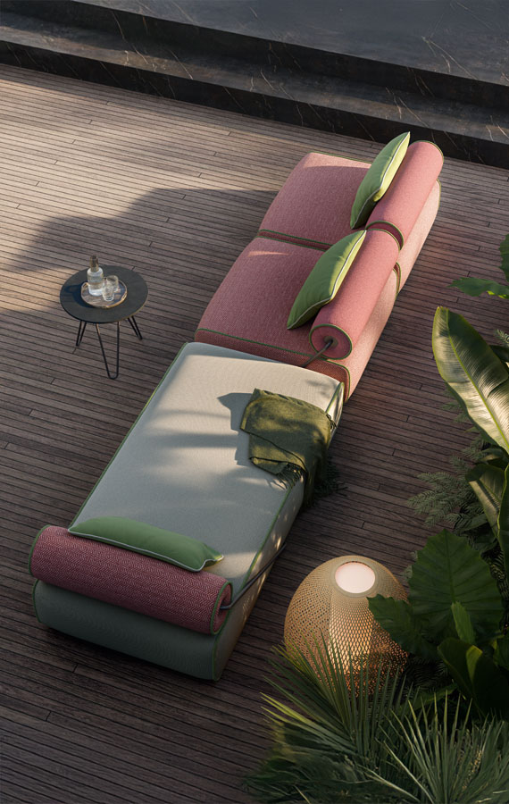 Design reference: Overhead view of pink and cream seating modules with green accent cushions and cylindrical backrests.