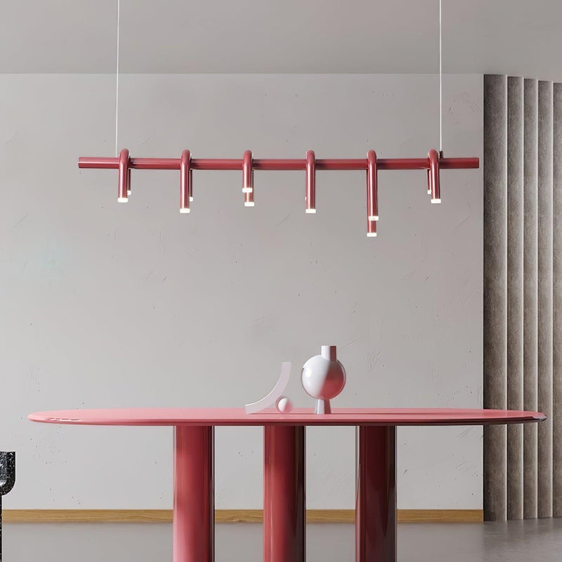 Linear chandelier above a dining table