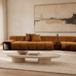 Front view of a cream low-profile sofa with banded upholstery and a dark open end insert.